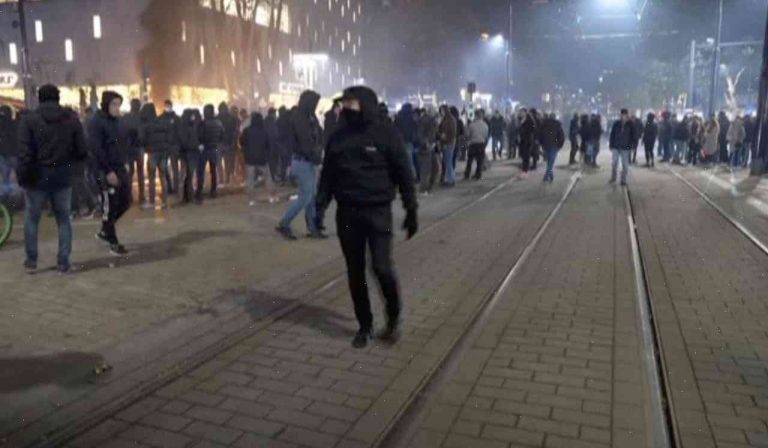 After clashes between racists and soccer fans, how many Dutch groups are shut out of society?