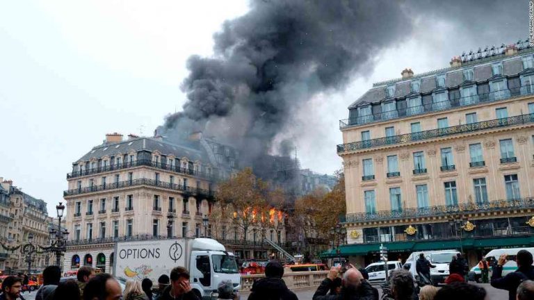Paris fire breaks out on roofs of buildings near Cathedral Basilica